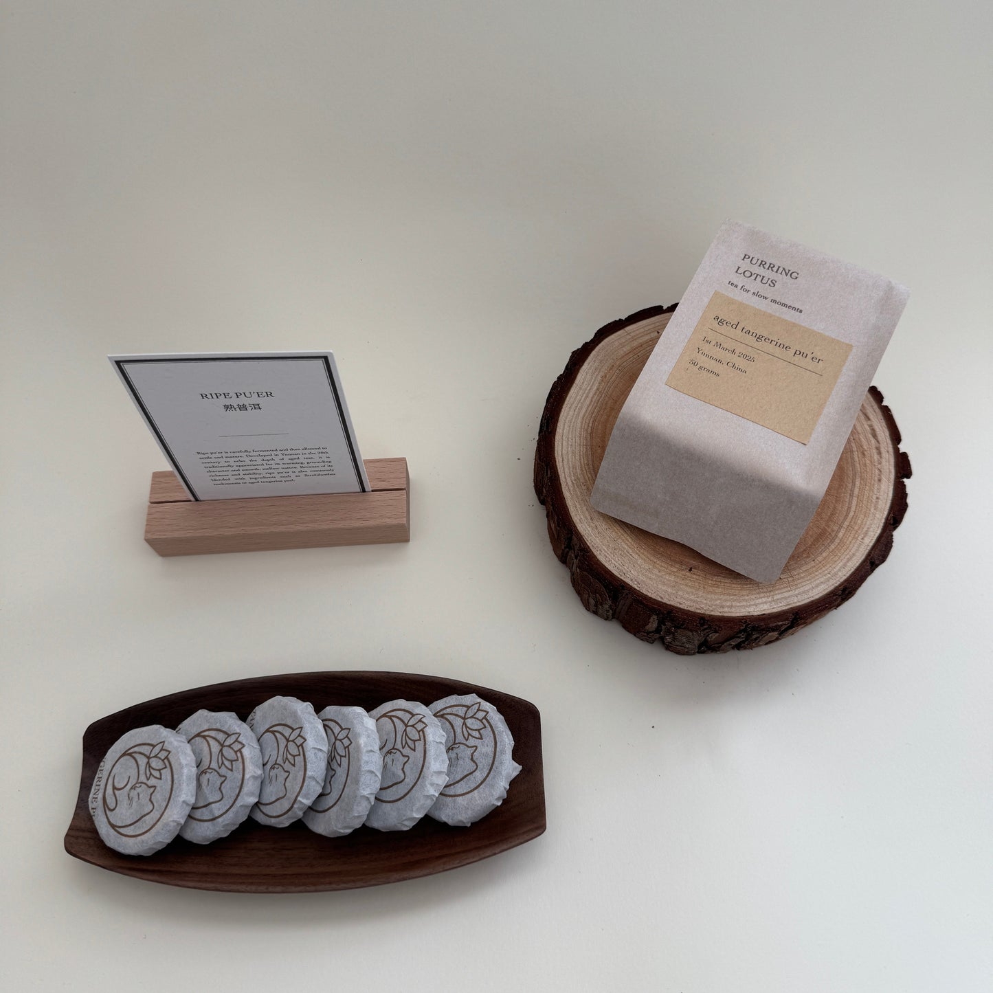 Aged tangerine pu'er mini-cakes with tea card and packaging