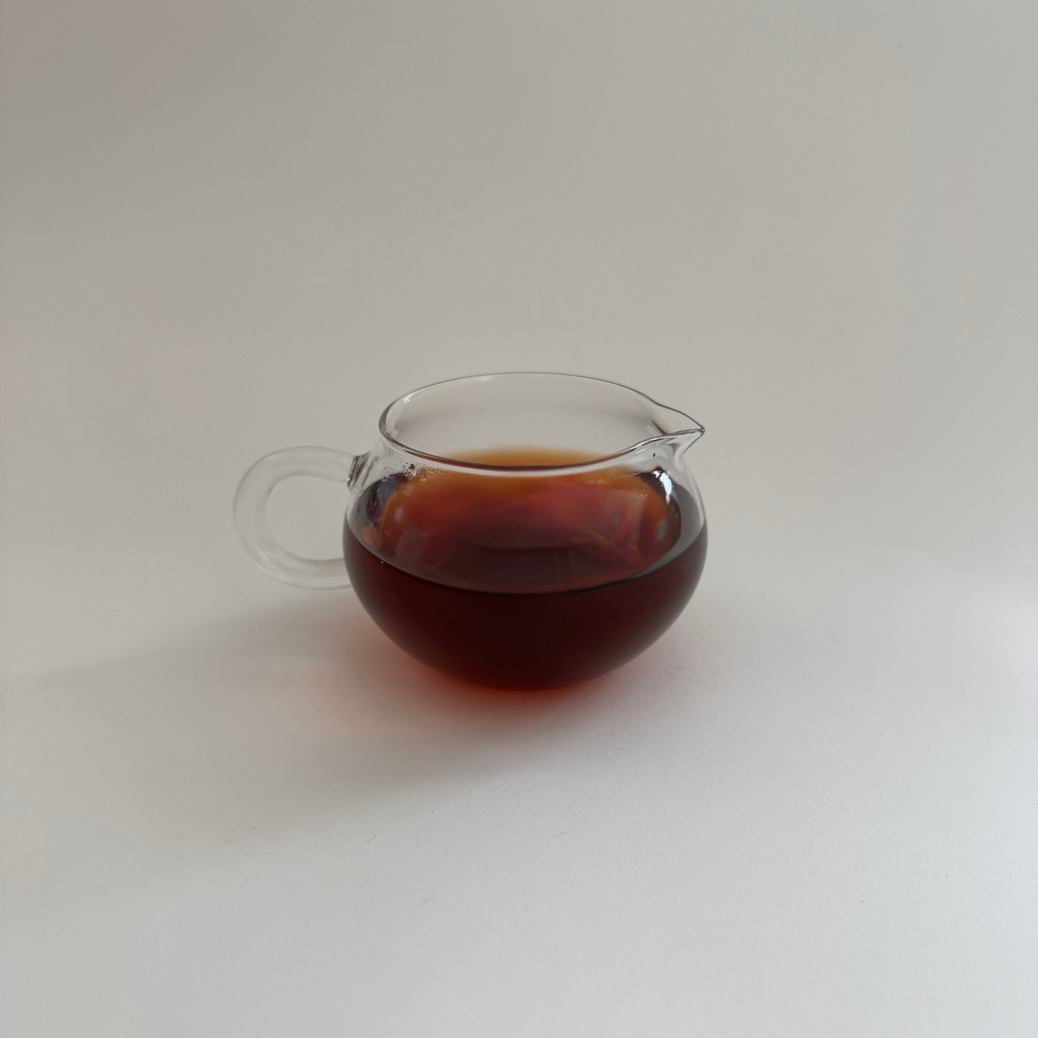 Glutinous rice pu'er liquor in a glass pitcher