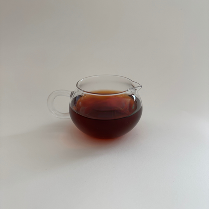 Glutinous rice pu'er liquor in a glass pitcher
