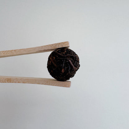 Ripe pu'er dragon ball close up