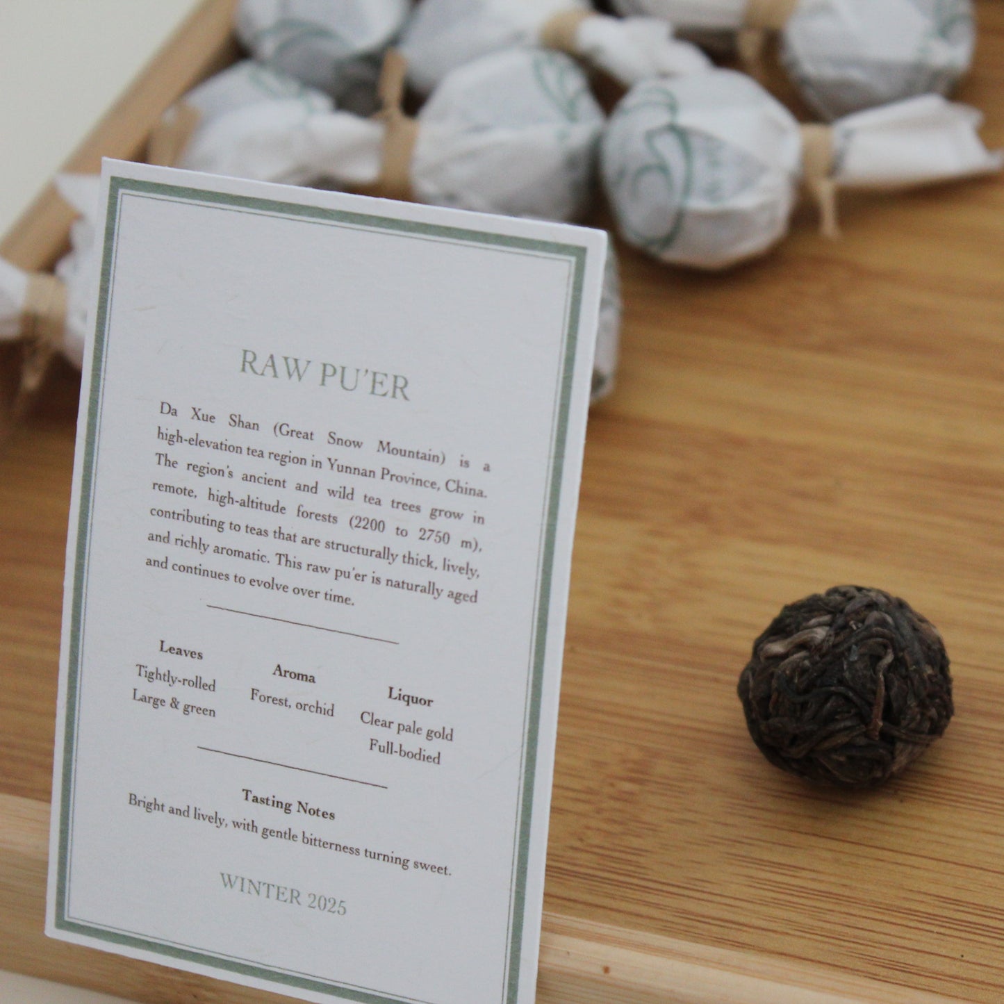 Raw pu'er ball with tea card