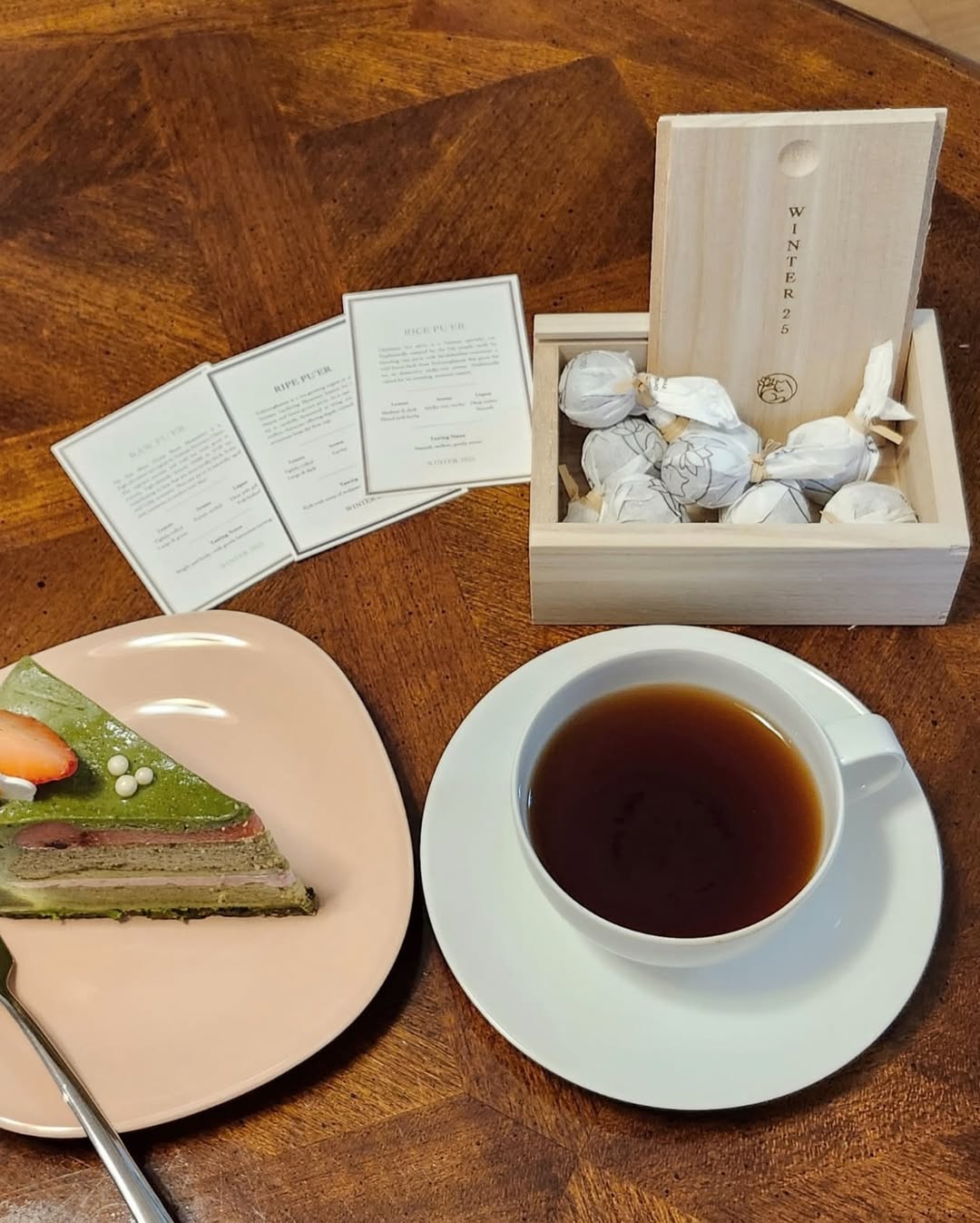 Puer collection box and cards with a cup of tea and cake
