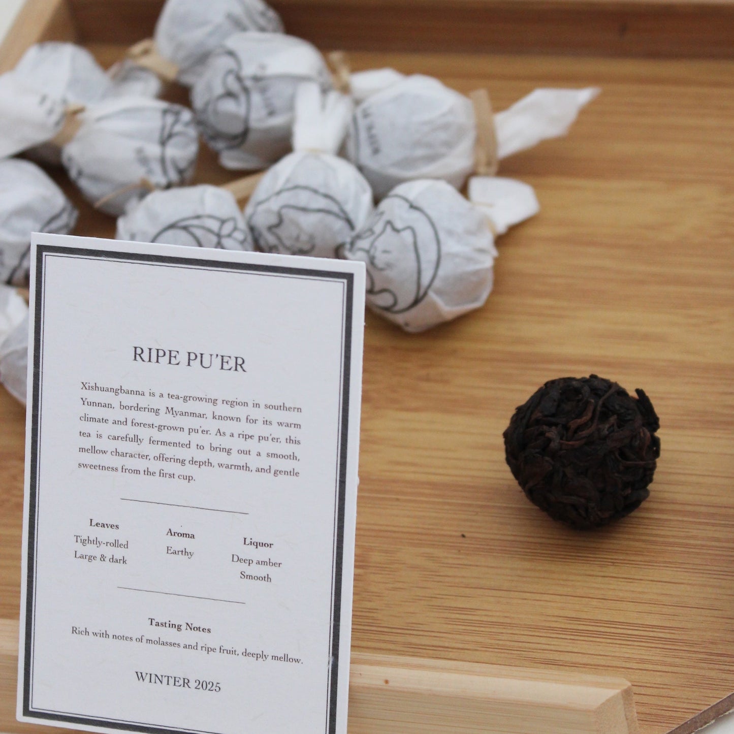Ripe pu'er ball with tea card