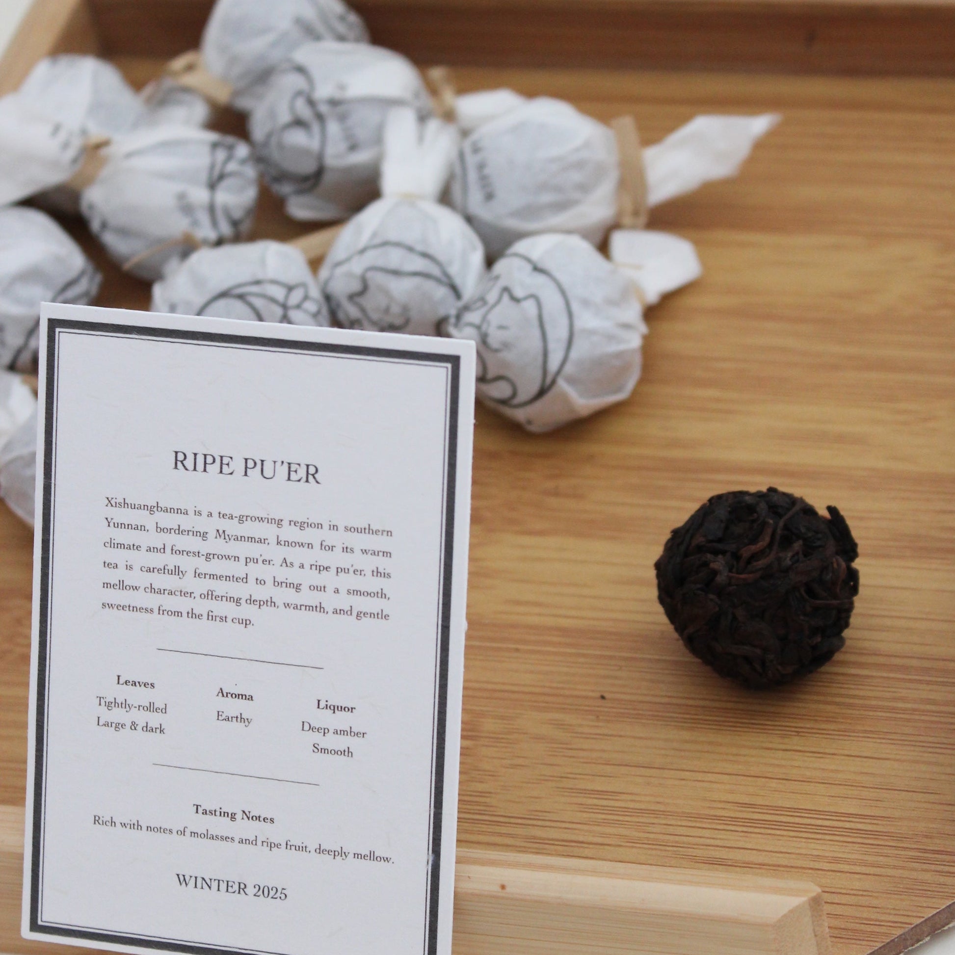 Ripe pu'er ball with tea card